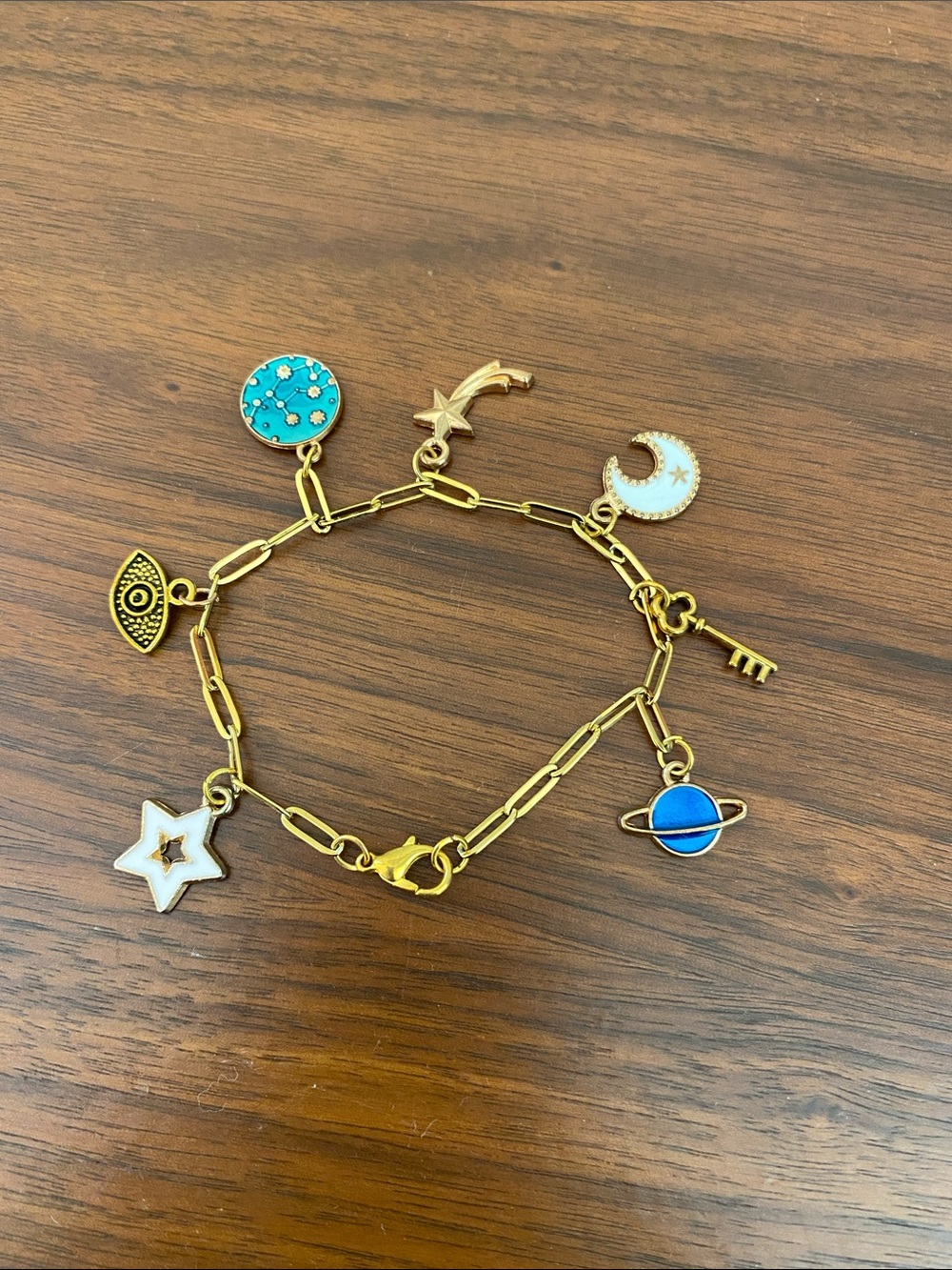 Gold-tone Celestial Charm Bracelet with Blue & Turquoise Accents